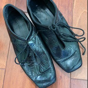 Black leather loafers